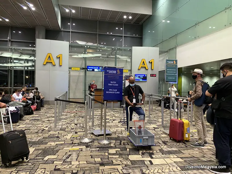 Waiting to board at Singapore Changi Airport for Singapore Airlines business class