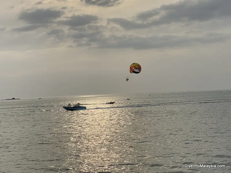 Parasailing at sunset at Pantai Cenang Langkawi