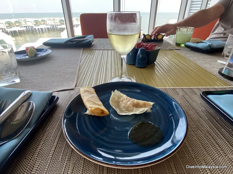 Waves Dining Lexis Hibiscus A snack and a cool glass of white at evening cocktail time