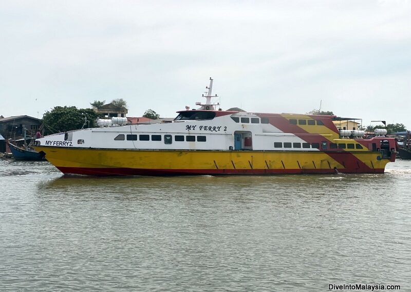 Watching another ferry arrive at Kuala Kedah